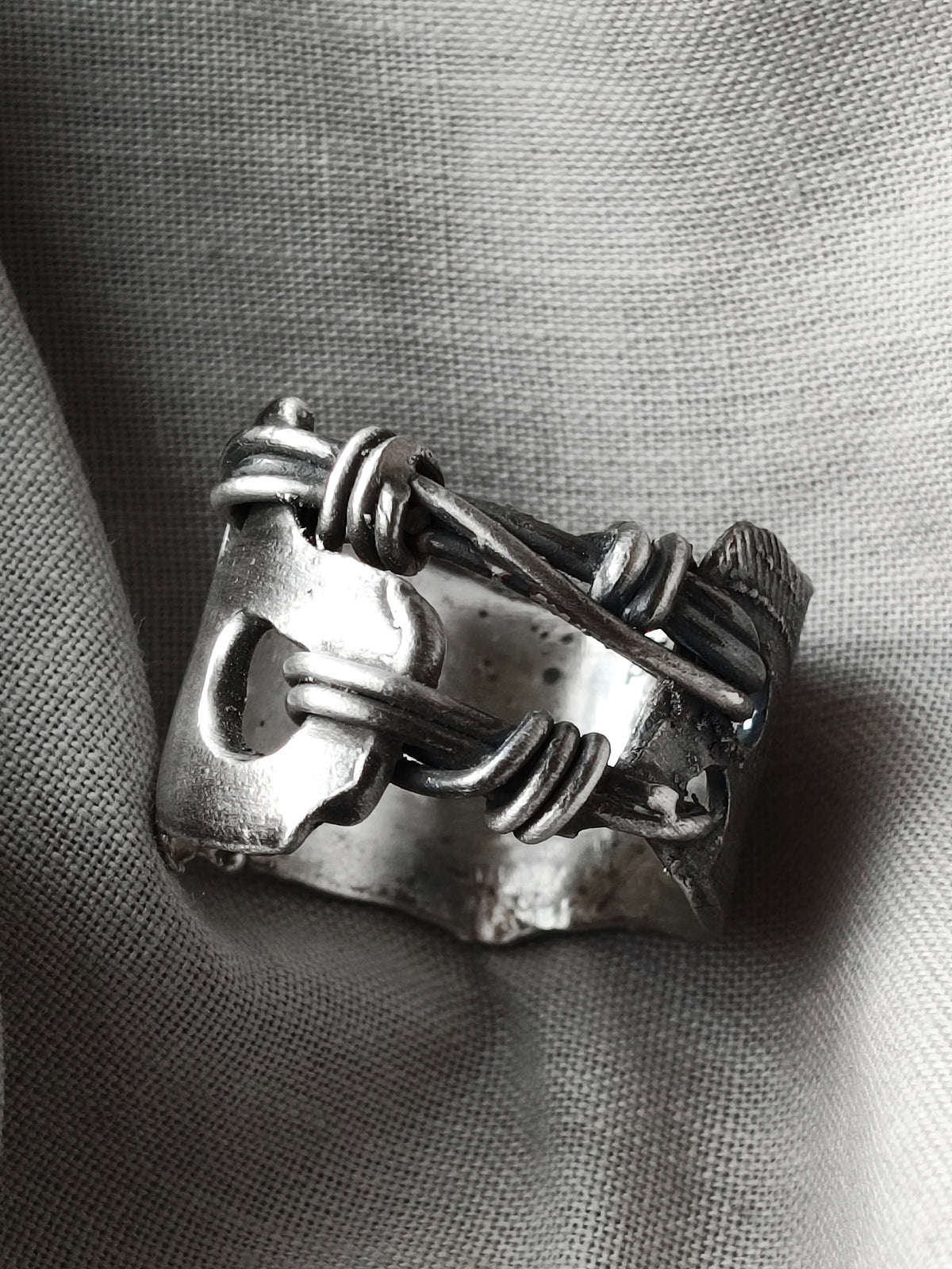 BOUND SILVER RING