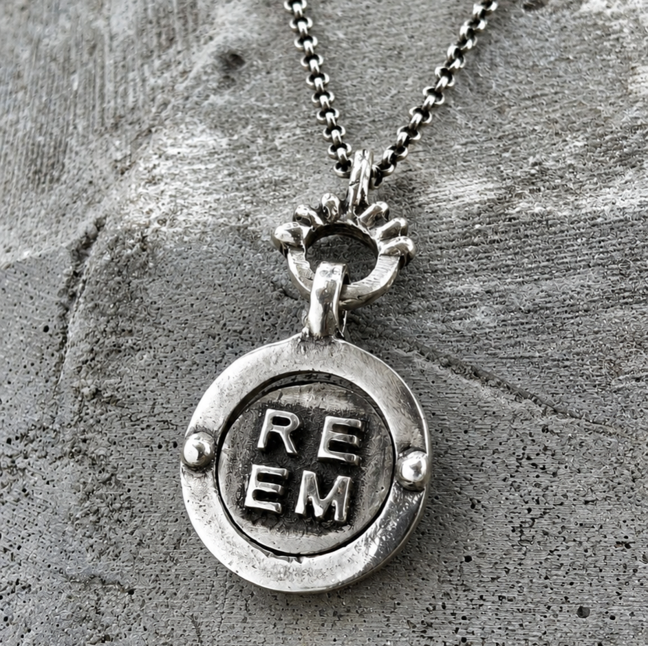 CUSTOM SILVER SPINNING CHARM